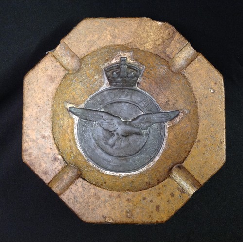 110 - WW2 RAF presentation octagonal ashtray made of stone with an inset lead RAF crest, metal plaque affi... 