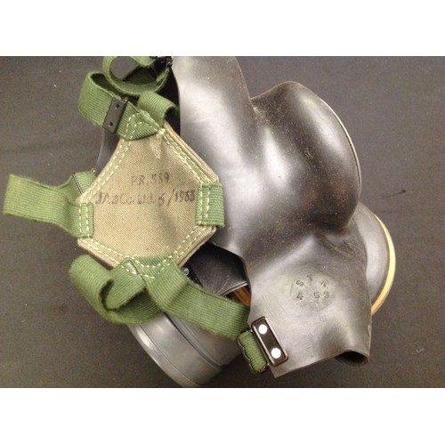 118 - WW2 pattern British Lightweight Respirator, mask dated 4-1953, straps dated 6/1963 and complete with... 