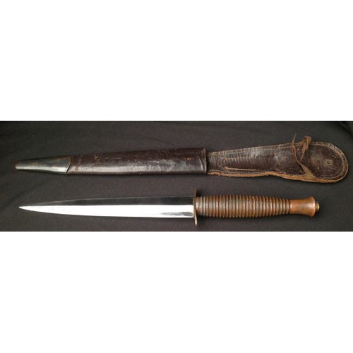 126 - WW2 British Third Pattern Fairbairn Sykes Fighting Knife. 167mm long double edged blade maker marked... 