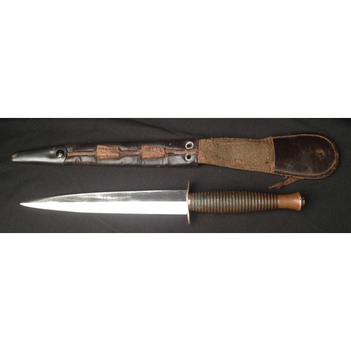 126 - WW2 British Third Pattern Fairbairn Sykes Fighting Knife. 167mm long double edged blade maker marked... 