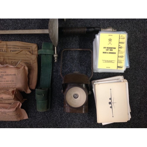 133 - A selection of mixed British Militaria, WW2 onwards to include: 3 fencing foils, one Spanish made de... 