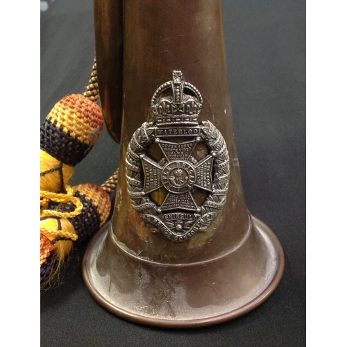 159 - Brass and Copper Bugle complete with cords with a Rifle Brigade cap badge affixed.