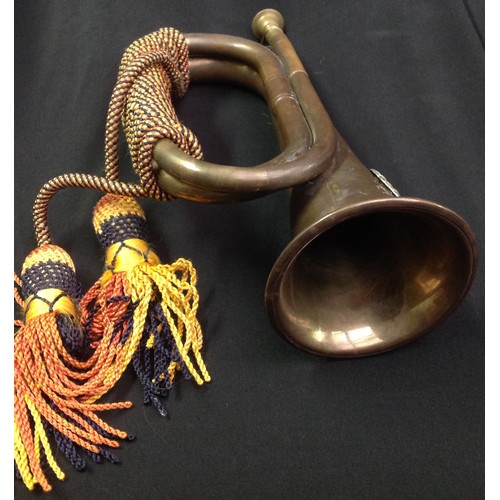 159 - Brass and Copper Bugle complete with cords with a Rifle Brigade cap badge affixed.