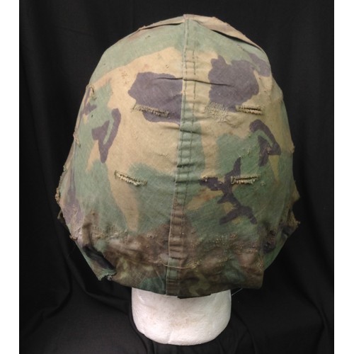 178 - US M1 Steel Helmet complete with liner and 1980's Woodland Pattern Camo cover to which is pinned and... 