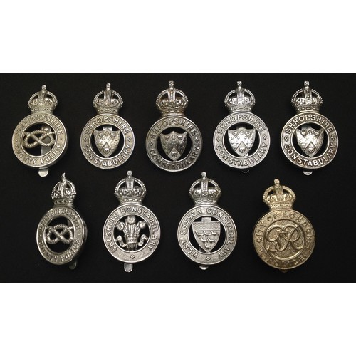 210 - A collection of Kings Crown Police Cap badges to include: Shrophire Constabulary x 4, Staffordshire ... 