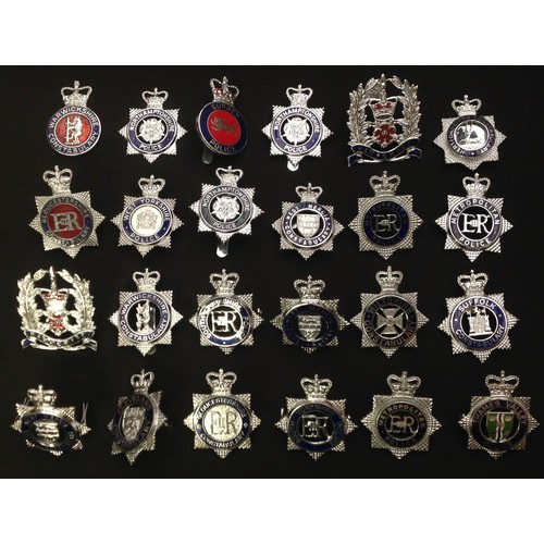 211 - A collection of British Queens Crown Police cap badges all with coloured enamels to include: Metropo... 