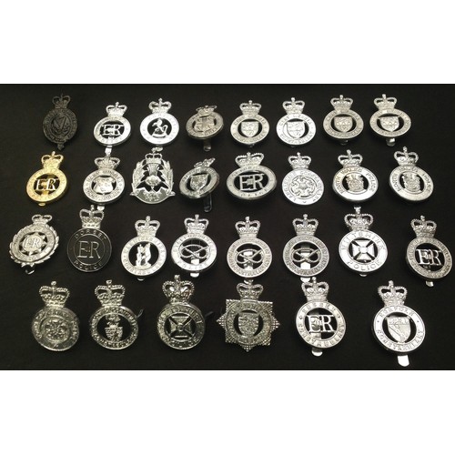 212 - A collection of British Queens Crown Police cap badges to include: City of London, Sussex Constabula... 