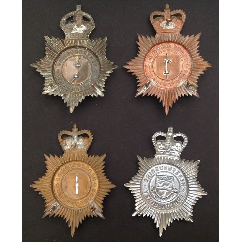 237 - A collection of four Herefordshire Constabulary Helmet Plates: Kings Crown Night Plate: Queens Crown... 