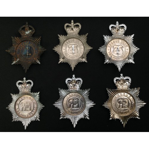 256 - A collection of six helmet plates: Kings Crown East Sussex Constabulary Night Plate: Queens Crown Ea... 