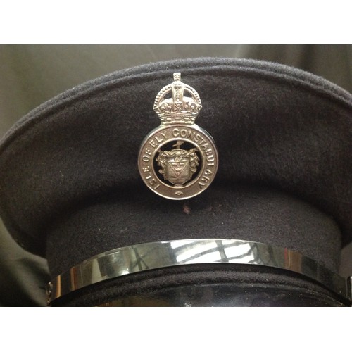 288 - Police Constables Peaked Cap. Kings Crown Isle of Ely Constabulary cap badge. Size marked 7 & 1/8th.... 