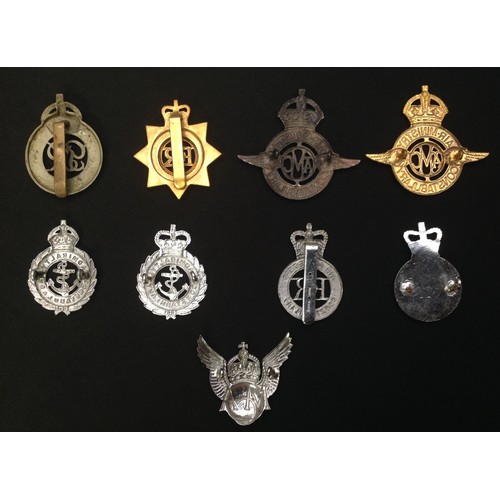 298 - A collection of Military Police Cap badges: Kings Crown War Dept Constabulary GR VI: Queens Crown ER... 