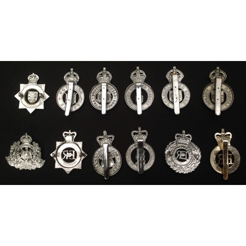 306 - A collection of Kings Crown and Queens Crown Police Cap Badges to include: Kings Crown Officers Esse... 