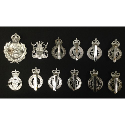 309 - A collection of Kings Crown and Queens Crown British Police Cap Badges to include: Kings Crown Bradf... 