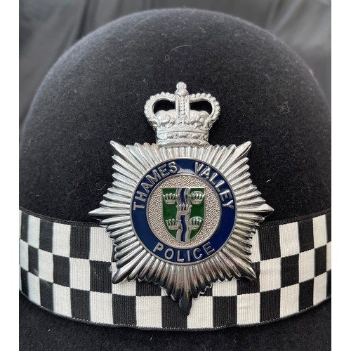 316 - Thames Valley Police WPC helmet. Queens Crown badge to front. No makers marks. Size approx 59.