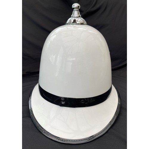 325 - Isle of Man Police Force White Helmet. Complete with Queens Crown Cap Badge, liner and chinstrap. Si... 