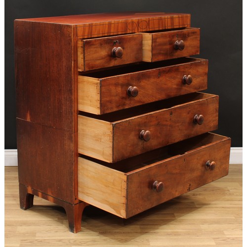 110 - A George IV mahogany chest, flush rectangular top above two short and three long graduated drawers, ... 