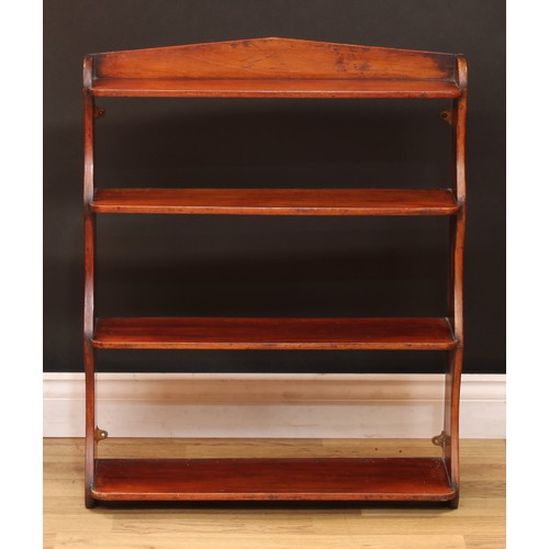 112 - A set of Victorian mahogany waterfall collectors wall shelves, 78cm high, 63cm wide, c.1880