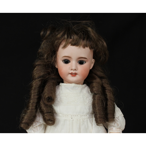 2306 - An S.F.B.J. (Societe Francaise de Fabrication de Bebe & Jouets, France) bisque head and painted comp... 