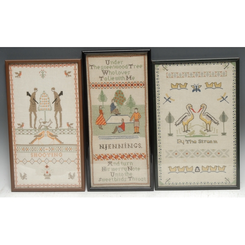 3305 - An Art Deco period needlework sampler, in cross-stitch on linen and depicting a tennis match, 36.5cm... 