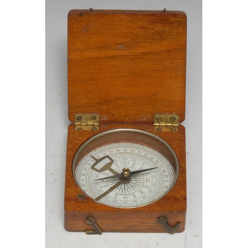 3332 - An early 20th century mahogany travelling pocket compass, hinged cover, the needle locking for trans... 