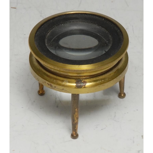 3387 - Cartography - a 19th century lacquered brass tripod map reading lens, screw-thread focus adjustment,... 