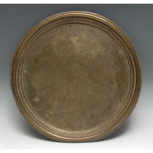 3351 - An Indian brass circular tray, the field engraved with Vishnu and other deities, 39cm diam, c.1900