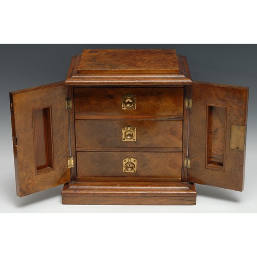 3272 - A Victorian burr walnut table cabinet, slightly oversailing pagoda top above a pair of rectangular d... 