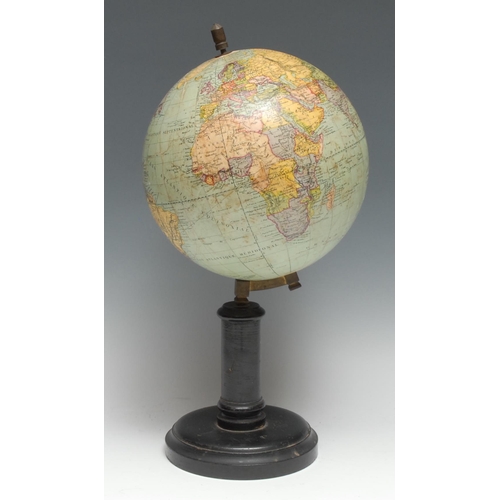 3329 - An early 20th century French terrestrial globe, by G. Thomas, Paris, ebonised stand, 38.5cm high