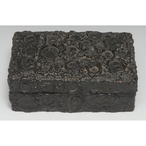 3368 - An unusual late 19th century rectangular box, decorated overall with seal impressions, hinged cover,... 