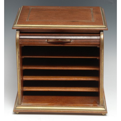 3315 - An early 20th century brass mounted mahogany desk top tambour front stationery cabinet, fitted with ... 