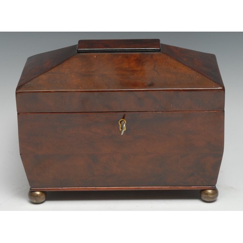 3345 - An early Victorian mahogany sarcophagus tea caddy, hinged cover enclosing a pair of of lidded compar... 