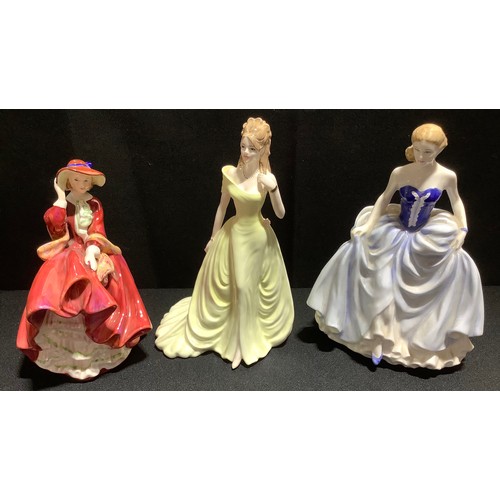 142 - A Royal Doulton figure, Top of the Hill;  Royal Doulton Classics Susan; a Coalport Ladies of Fashion... 