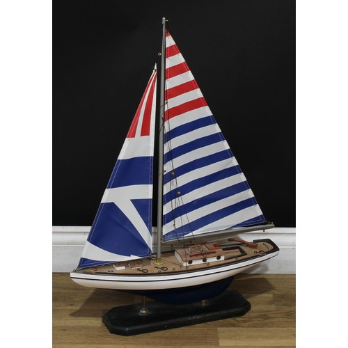 200 - Model Sailing - a wooden model of a sailing yacht, 100cm over base; another, smaller, 71cm over base... 