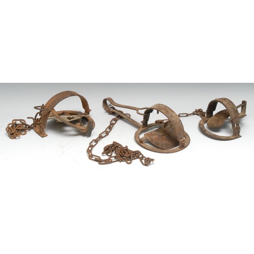 3408 - Gamekeeping - Trapping - a 19th century iron egg trap, 15cm jaws, 35cm long overall; another, 15cm j... 