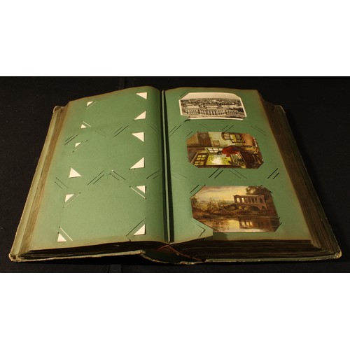 300 - A large Edwardian postcard album containing British and world postcards, mostly early 20th century