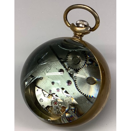 321 - Erotica - a novelty desk timepiece, bullseye lens enclosing erotic plateau, approximately 6cm over l... 