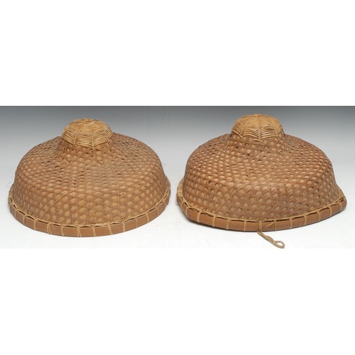 3185 - A large pair of Chinese kasa or sugegasa conical hats, 62cm diam, probably from Hainan, mid-20th cen... 