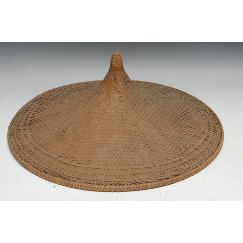 3185 - A large pair of Chinese kasa or sugegasa conical hats, 62cm diam, probably from Hainan, mid-20th cen... 