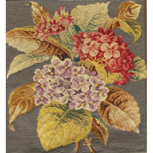 361 - A 19th century woolwork panel, leafy flowers, 45cm x 40cm, framed