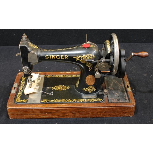 404 - A Singer hand cranked sewing machine