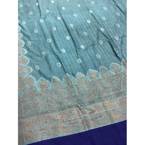 481 - Textiles - a Zari shawl embroidered in gold thread on a turquoise blue ground, cobalt borders, appro... 