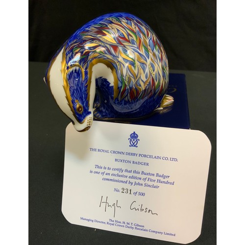 62 - A Royal Crown Derby paperweight, Buxton Badger, exclusive to John Sinclair, gold stopper, certificat... 