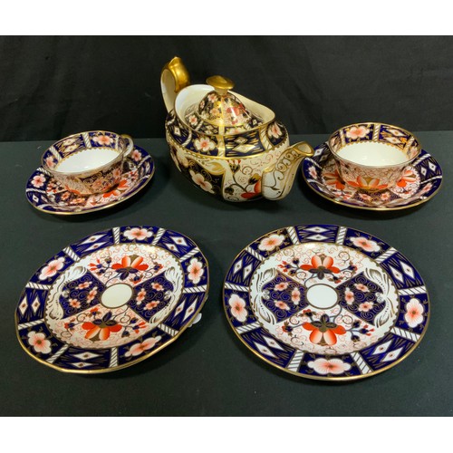 185 - A Royal Crown Derby 'Witches' Pattern Teapot, pattern number 2451; and a pair of Royal Crown Derby '... 