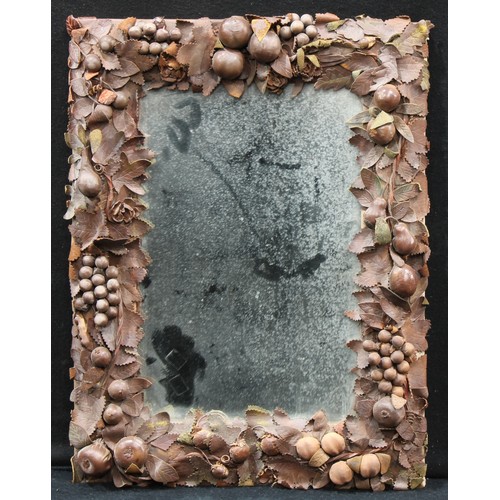 589 - Interior Design - an interesting wall mirror, the frame modelled in brown leather with ripe fruit an... 