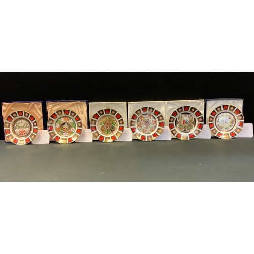 219 - Royal Crown Derby Christmas plates, each boxed, The Royal Crown Derby Christmas plate limited editio... 