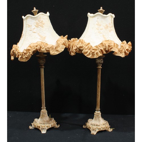 598 - A pair of decorative side lights, with embroidered shades, fluted columns, leafy bases, with scroll ... 