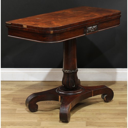 102 - A William IV rosewood card table, hinged top enclosing a baize lined playing surface, lotus grasped ... 