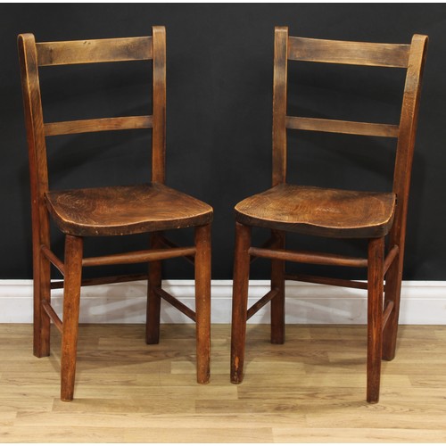 106 - A late Victorian oak side table, rounded rectangular top with moulded edge, tapered cylindrical legs... 