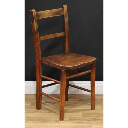 106 - A late Victorian oak side table, rounded rectangular top with moulded edge, tapered cylindrical legs... 