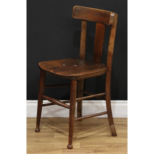 106 - A late Victorian oak side table, rounded rectangular top with moulded edge, tapered cylindrical legs... 